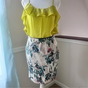 Spaghetti adjustable strap ruffle top.